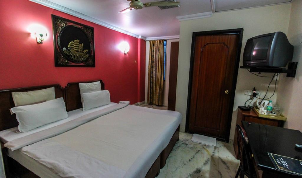 Hotel Pigeon International Bangalore Camera foto