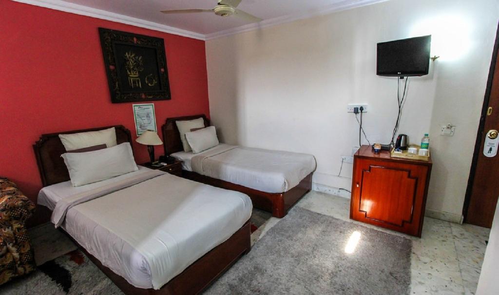 Hotel Pigeon International Bangalore Camera foto