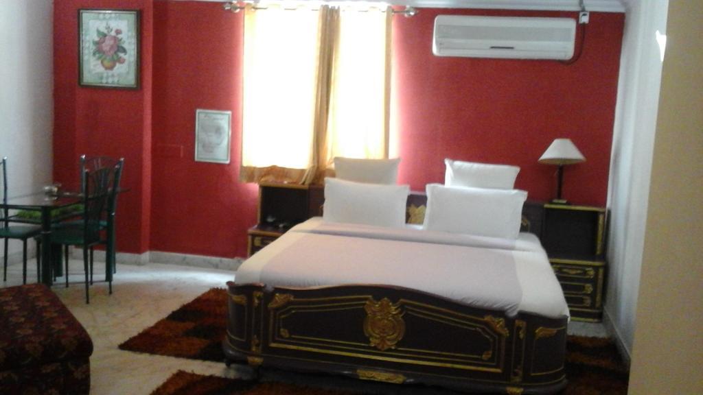 Hotel Pigeon International Bangalore Esterno foto