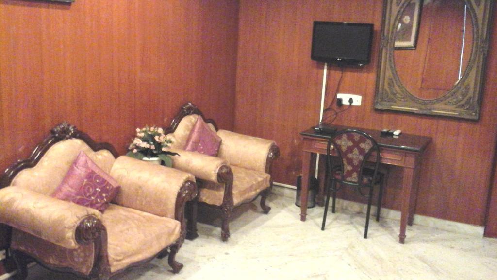 Hotel Pigeon International Bangalore Esterno foto
